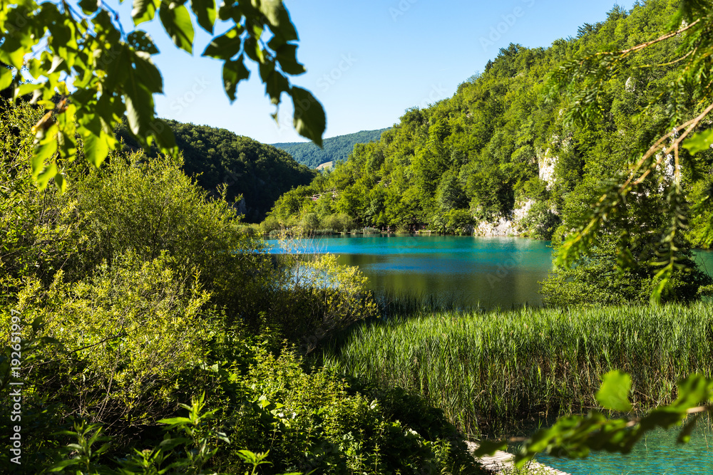 Beautiful postcard with view lakes Plitvice National Park of Croatia. Green turquoise natural background.