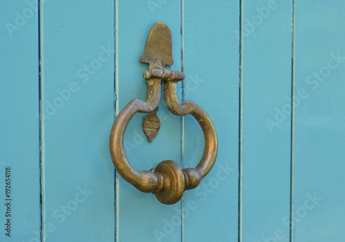 Blue handle door rusty iron ring photo