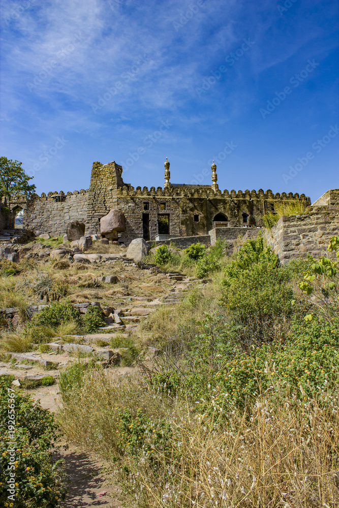 Hiking up to the Temple at the top of Golconda Fort in Hyderabad, India Hiking up to the Temple at the top of Golconda Fort in Hyderabad, India