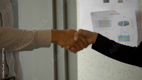 SLO MO Male and female business handshake agreement photo