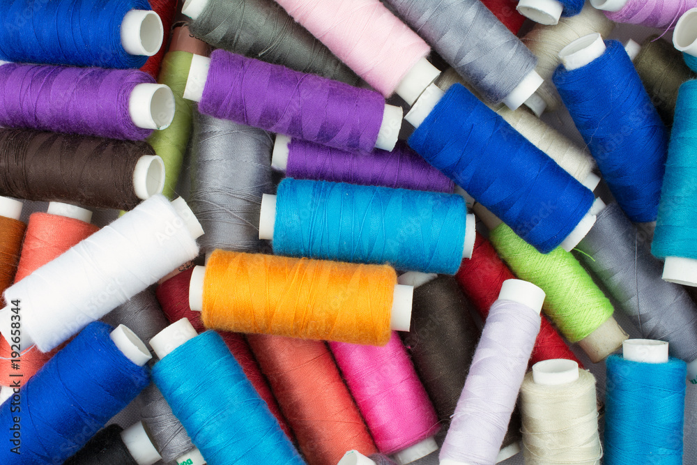 texture multicolored thread on reels selective focus texture multicolored thread on reels selective focus