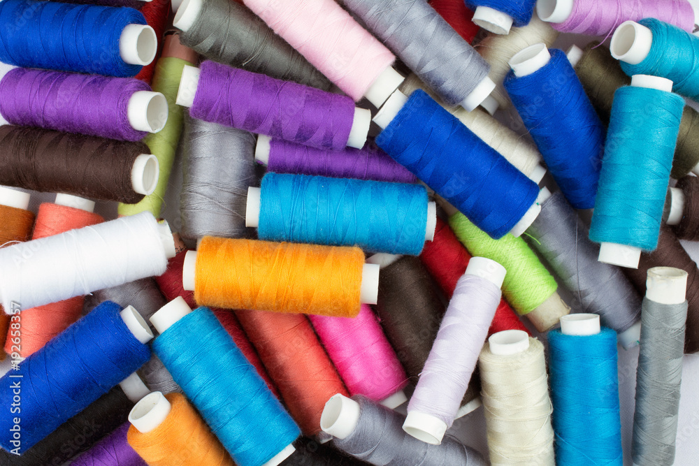 texture multicolored thread on reels selective focus texture multicolored thread on reels selective focus