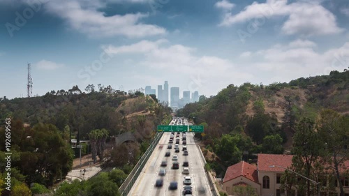 Freeway road to downtown Los Angeles, Daytime. 4K UHD Timelapse.