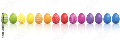 Easter eggs. Lined up with different colors and patterns. Rainbow colored three-dimensional isolated vector illustration on white background.
