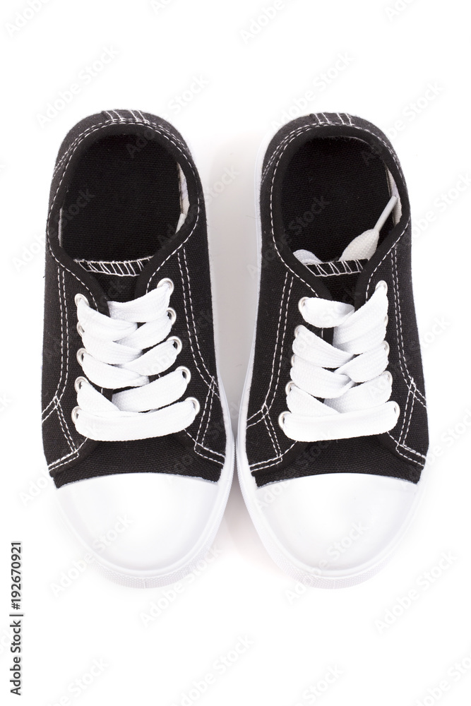 Classic Black Shoes Sneakers on a White Background Classic Black Shoes Sneakers on a White Background