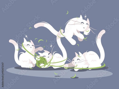 Kittens play with ball of threads