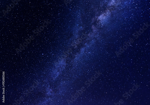 Bright milky way core and starry night sky at Kudat, sabah Malaysia. image contain soft focus, blur and noise due to long expose and high iso.