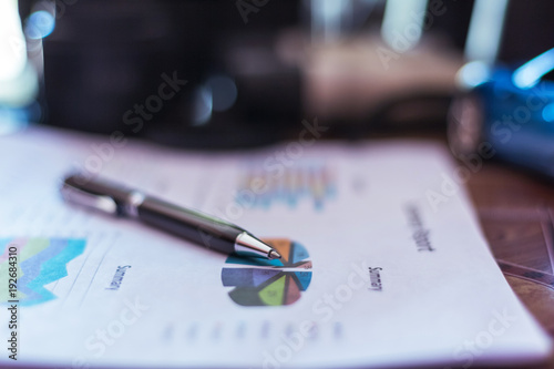 business chart and pen