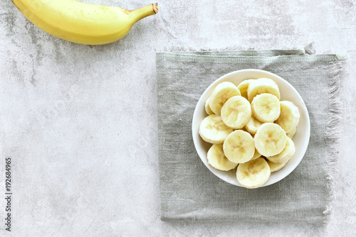 Sliced ripe banana in bowl