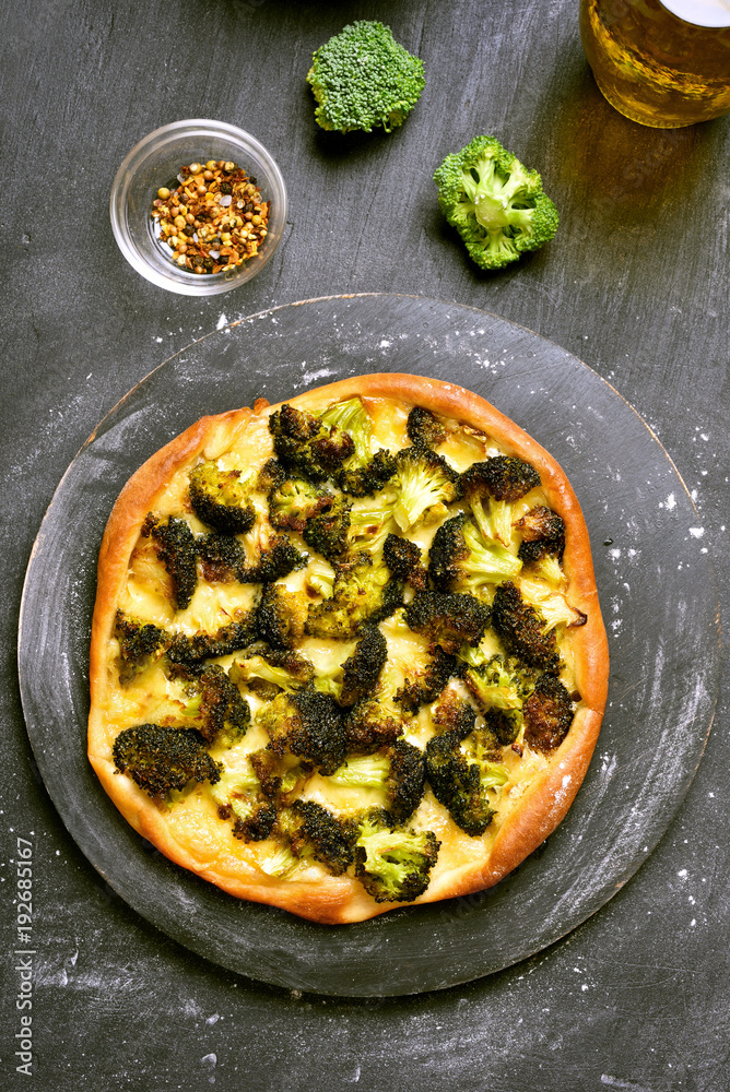 Pizza with broccoli and cheese