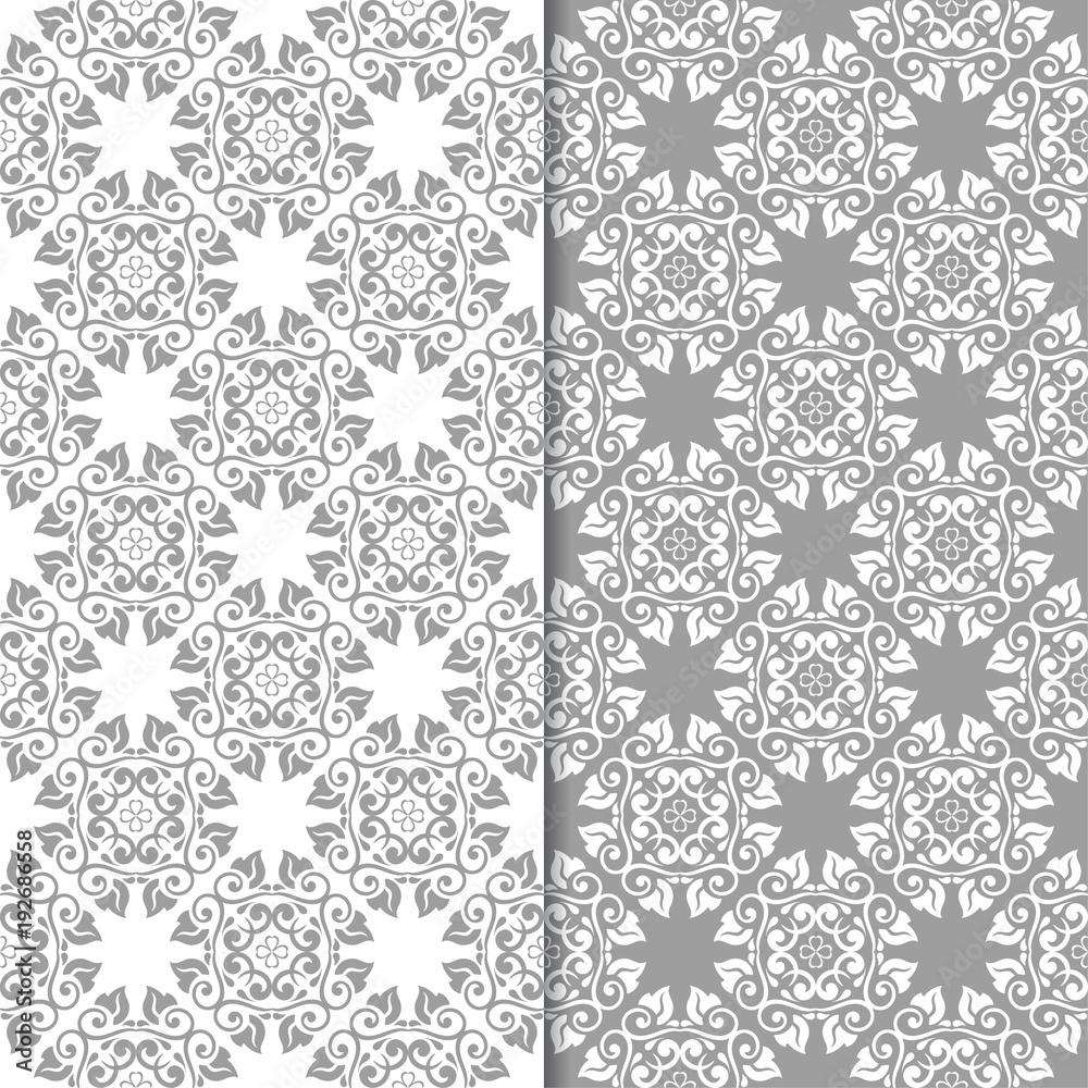 White and gray set of floral seamless patterns White and gray set of floral seamless patterns