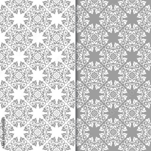 White and gray set of floral seamless patterns