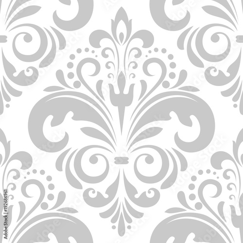 Wallpaper in the style of Baroque. A seamless vector background. White and grey floral ornament. Graphic vector pattern.