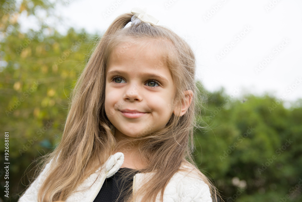 cute little blond girl in park emotional face cute little blond girl in park emotional face