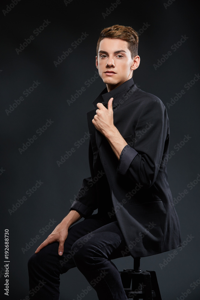 Fototapeta premium handsome young man in black jacket