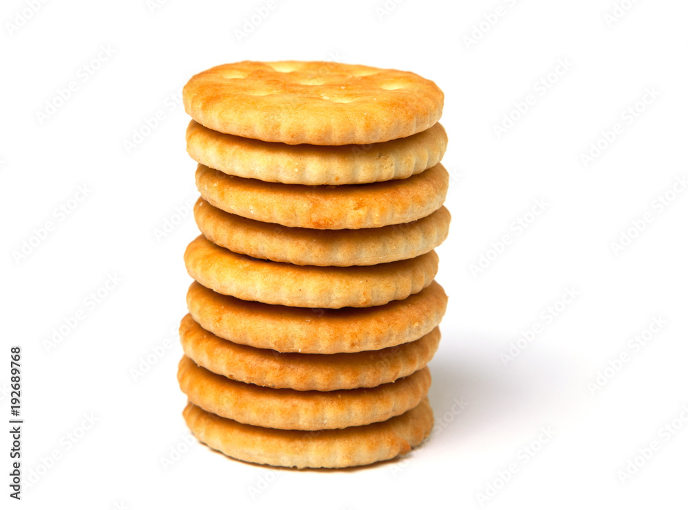 Biscuit cracker stack of yellow round isolated on white background Biscuit cracker stack of yellow round isolated on white background