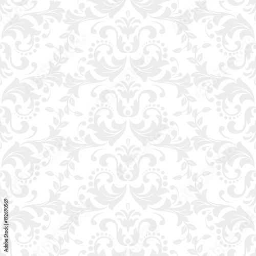 Wallpaper in the style of Baroque. A seamless vector background. White and grey floral ornament. Graphic vector pattern.