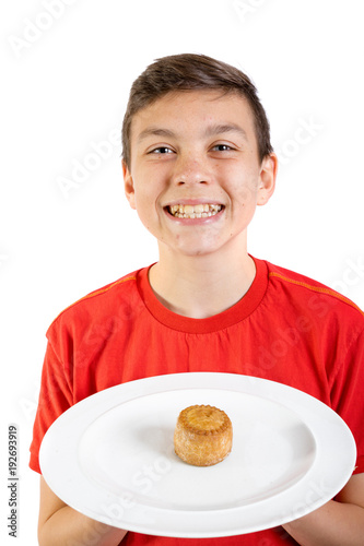 Young caucasian teenage boy with a pork pie