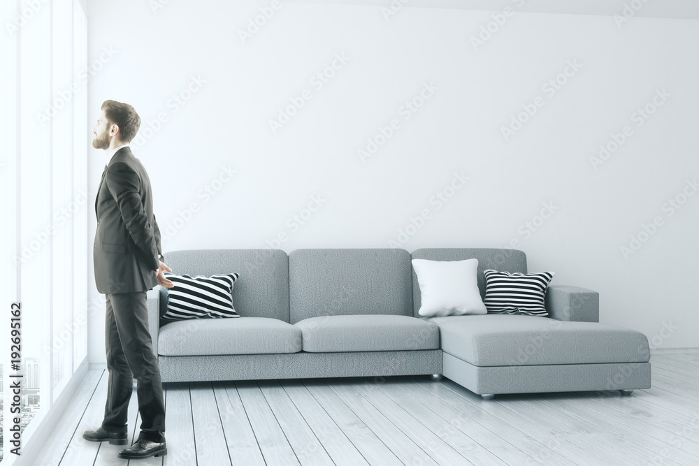 Man in modern living room Man in modern living room