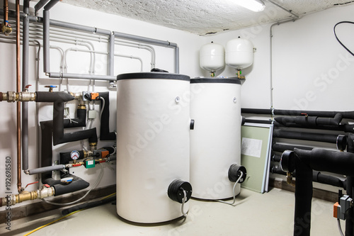 two big white boiler and heating net photo