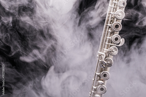 A flute in smoke