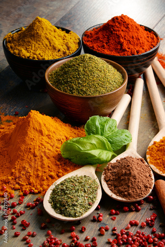 Fototapeta Naklejka Na Ścianę i Meble -  Variety of spices on kitchen table