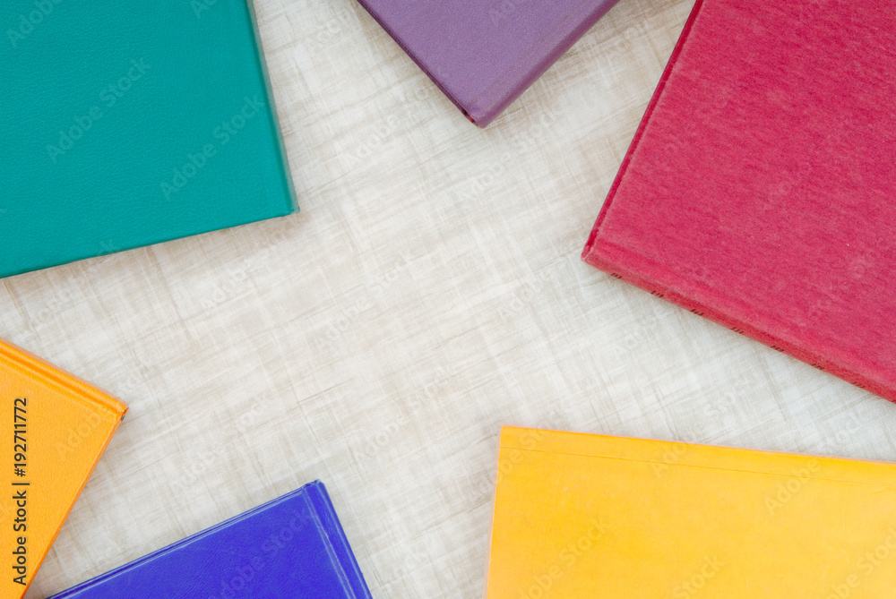 books are on the table, empty space, texturing backgrounds, framework is from multicolor books, books are on the table, empty space, texturing backgrounds, framework is from multicolor books,
