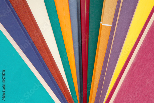 pile of multicoloured books, bunch of multicolored books, heap of books, backgrounds is out of multi-colored books, textured background, stack of multi-colored books,
