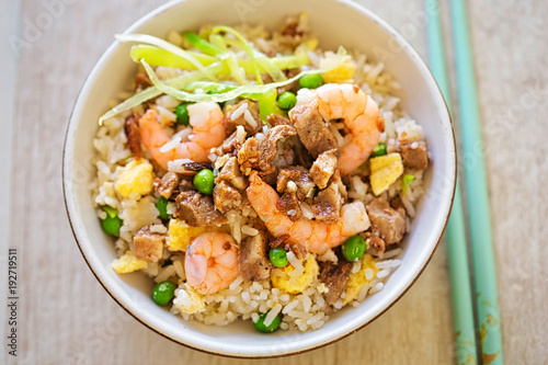 Fried rice with char sui pork, prawns, egg and vegetables with sesame oil 