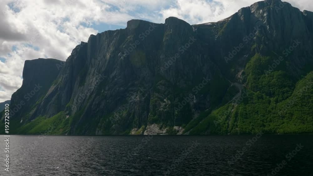 Beautiful rock tall cliffs in Western Brook Pond in Gros Morne Beautiful rock tall cliffs in Western Brook Pond in Gros Morne