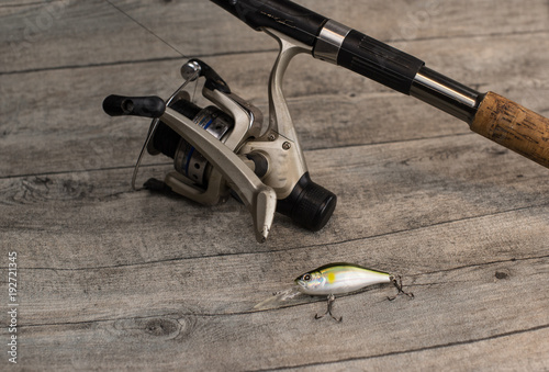 fishing tackle on a wooden table
