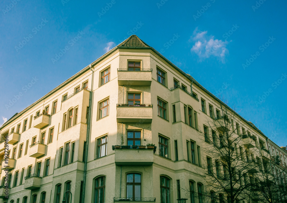 corner building in berlin with blue sky