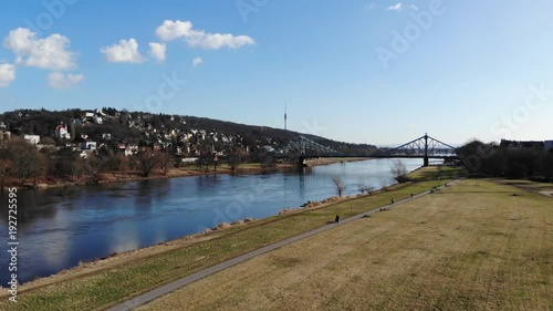 Aerial drone shot of Dresden Loschwitzer Bridge Blaues Wunder early morning with beautiful sunrise scenery Germany photo