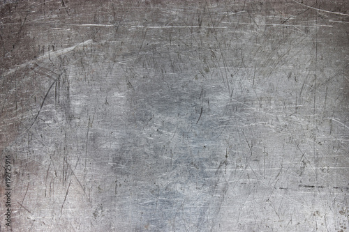 Old metal sheet background, brushed silver surface of iron