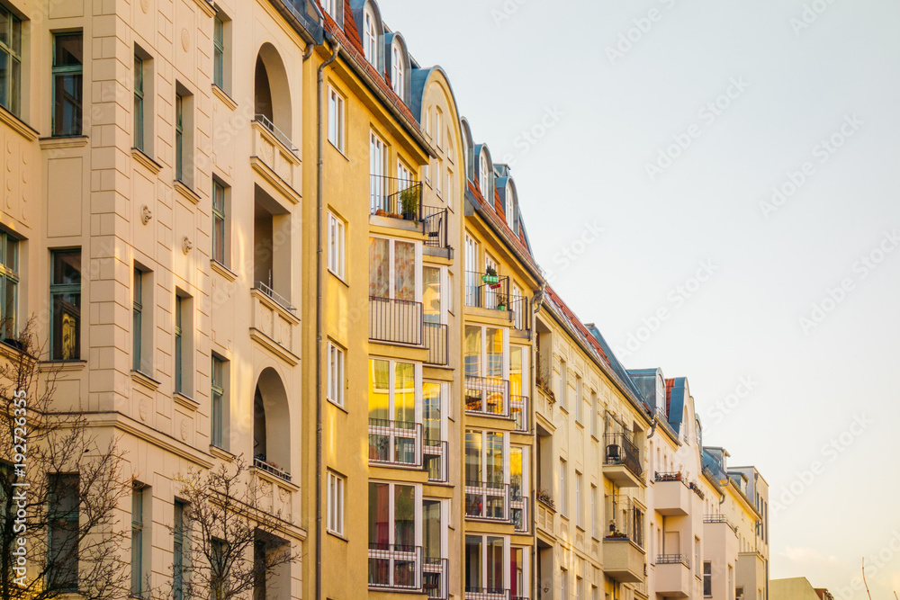 warm colored yellow apartment houses