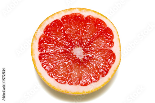 Ripe half of pink grapefruit citrus fruit isolated on white background with clipping path photo