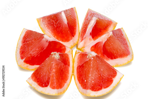 Ripe half of pink grapefruit citrus fruit isolated on white background with clipping path photo