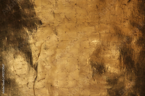 Gold wall texture background with dimming elements