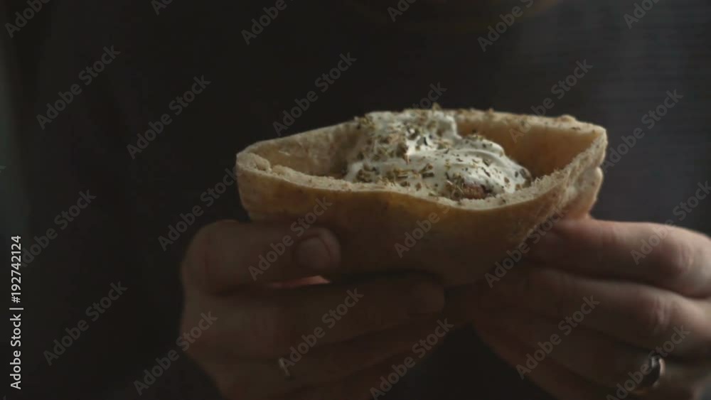 Fajita with sour cream in the hands of a man. Mexican dish. Video Fajita with sour cream in the hands of a man. Mexican dish. Video