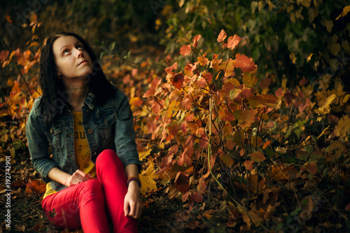 Autumn photography of a beautiful girl in the forest