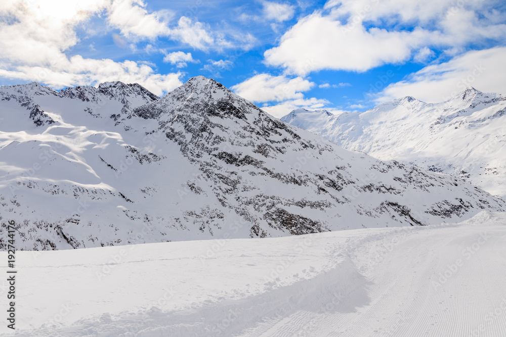 Groomed walking track in beautiful mountains during winter season, Obergurgl-Hochgurgl ski area, Austria