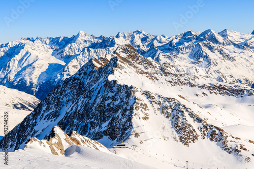 Mountains covered with snow in Solden ski area on beautiful sunny winter day, Tirol, Austria