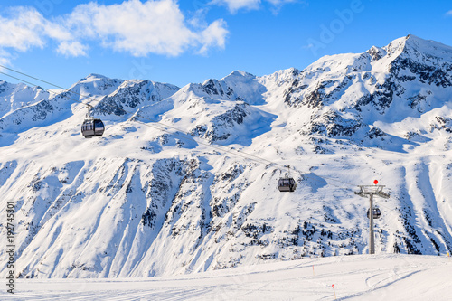 Gondola cars on lift in beautiful mountains in winter season in Hochgurgl-Obergurgl ski area, Tirol, Austria