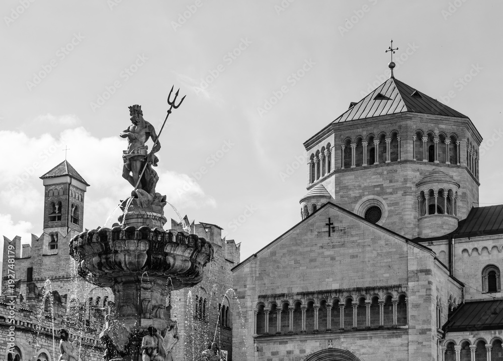 Trento city: main square Piazza Duomo, with clock tower and the Late Baroque Fountain of Neptune. City in Trentino Alto Adige, northern Italy, Europe