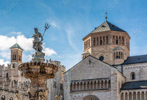 Trento city: main square Piazza Duomo, with clock tower and the Late Baroque Fountain of Neptune. City in Trentino Alto Adige, northern Italy, Europe photo