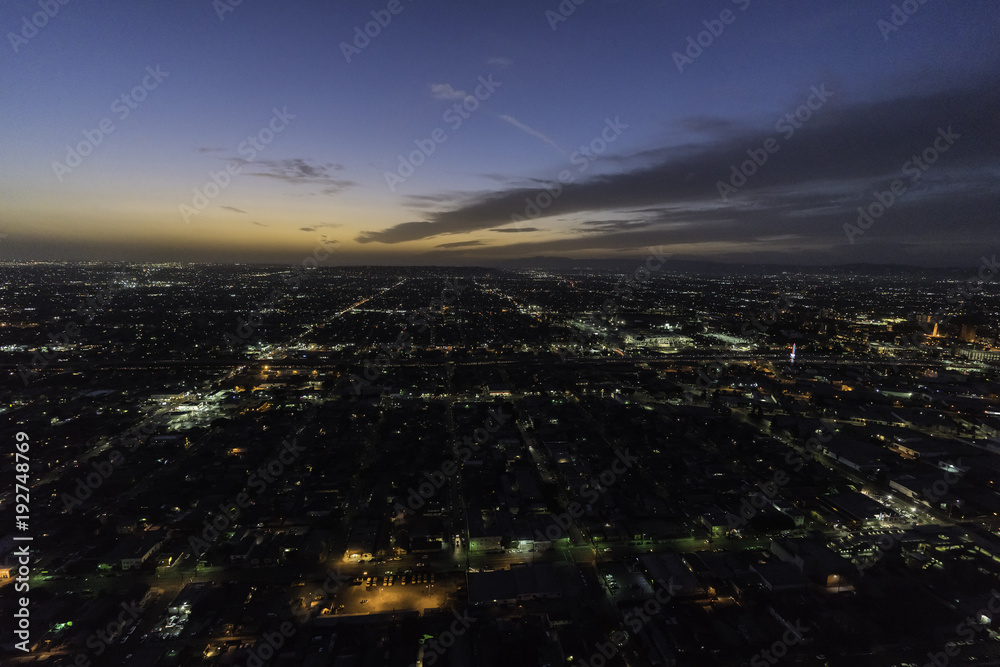 Night aerial view of buildings and streets in South Los Angeles California.