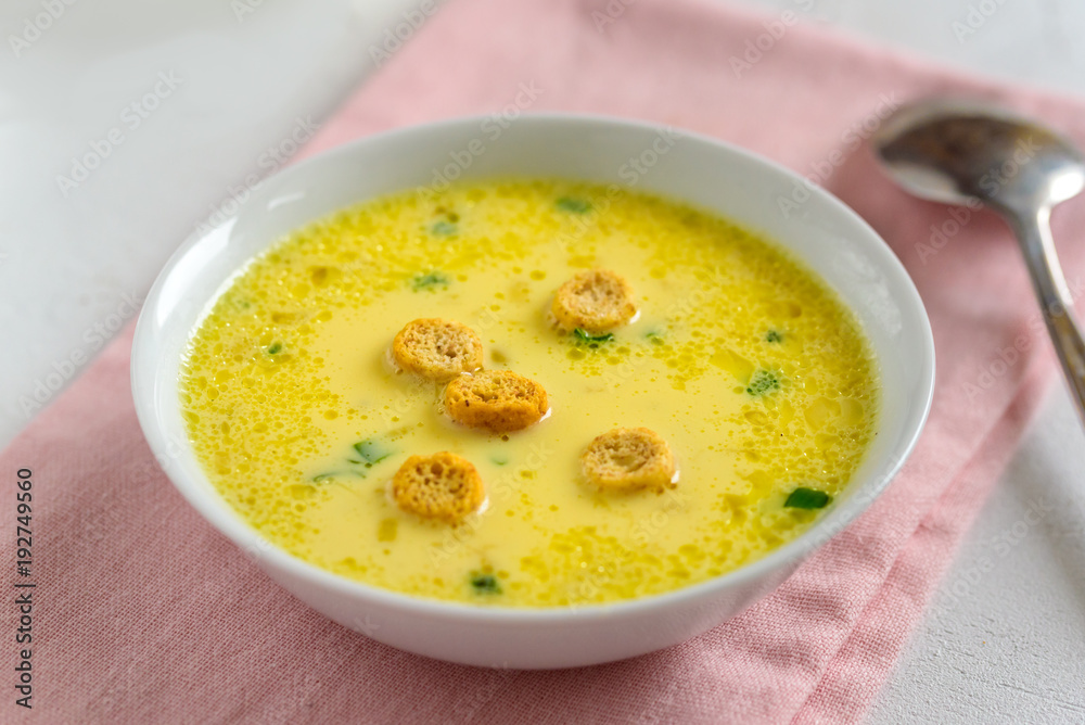 Cheese soup with croutons and fresh herbs. Cheese soup with croutons and fresh herbs.