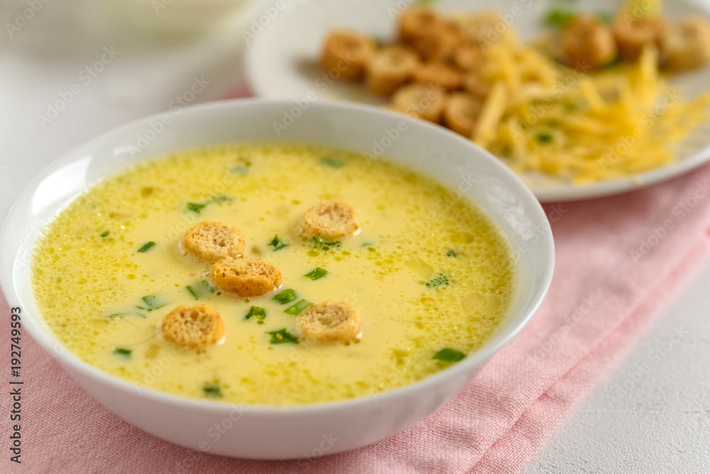 Cheese soup with croutons and fresh herbs. Cheese soup with croutons and fresh herbs.