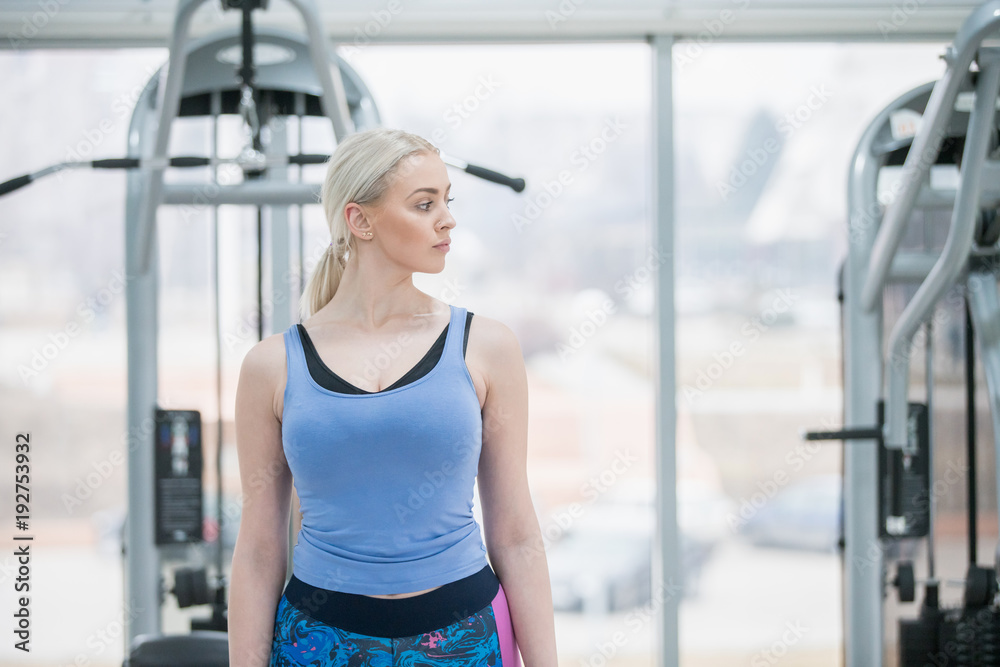 Portrait of beautiful young woman in the gym Portrait of beautiful young woman in the gym