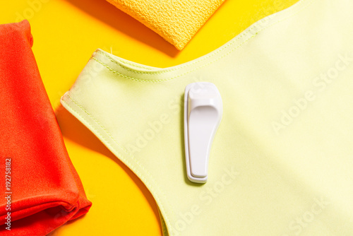 Photos shop security anti-theft sensor on bright dress